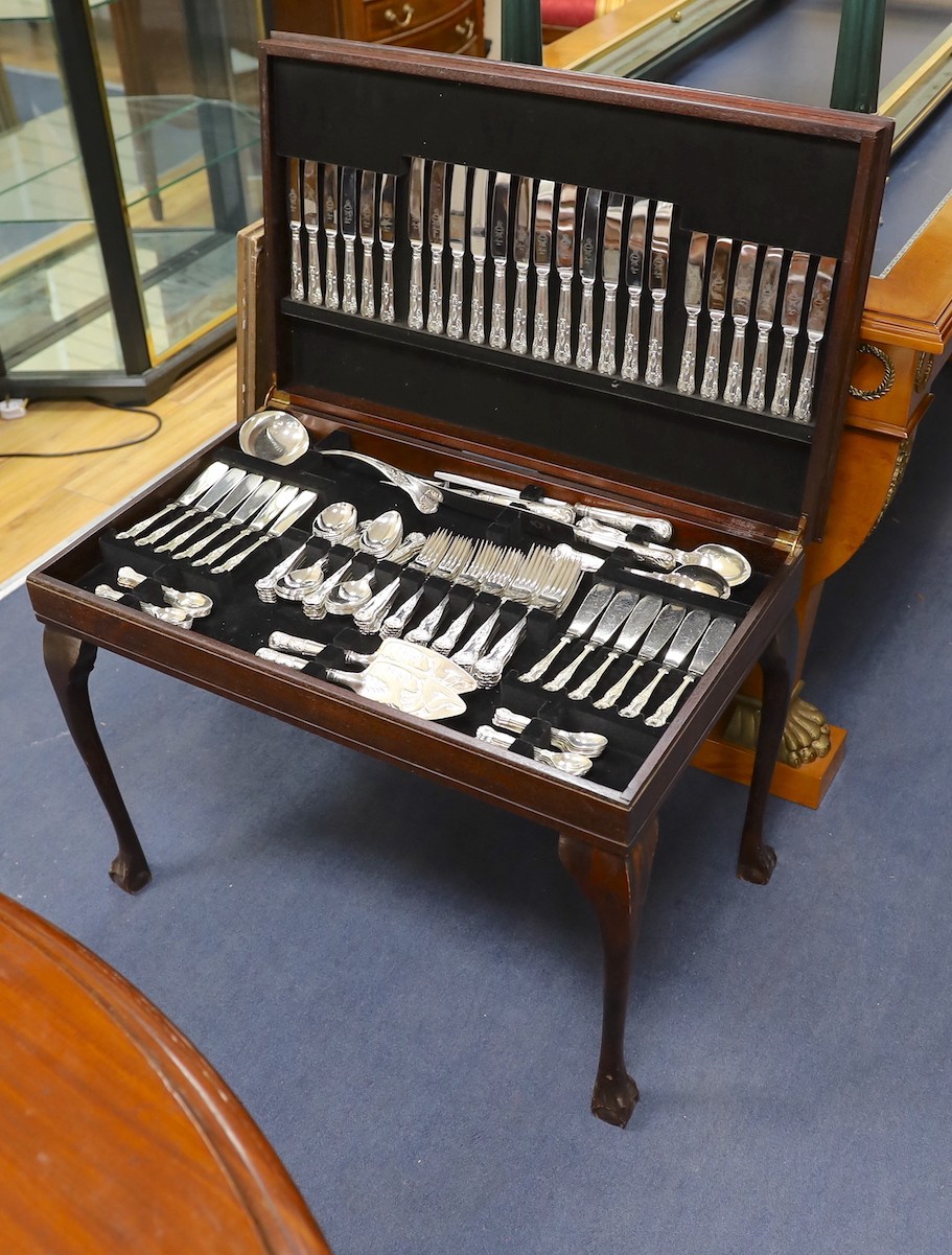 A leather inset canteen of silver plated flatware